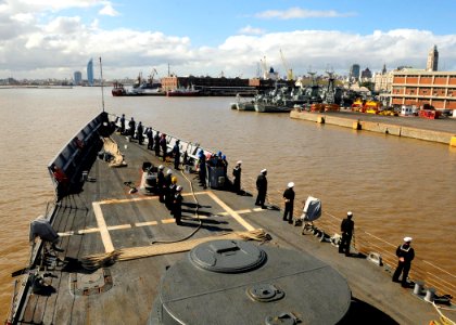 US Navy 100507-N-9301W-345 Sailors man the rails as the guided-missile frigate USS Klakring (FFG 42) pulls into port in Montevideo, Uruguay while on her Southern Seas 2010 deployment