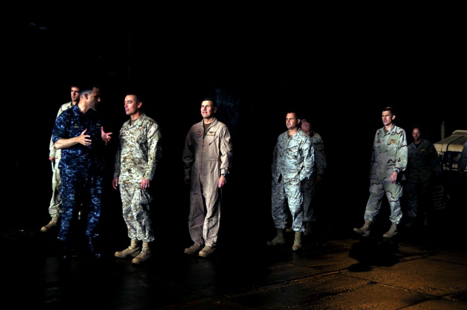 US Navy 100507-N-8936G-053 Capt. Ronald Reis, left, commanding officer of the amphibious assault ship USS Nassau ((LHA 4), gives a tour of Nassau's well deck