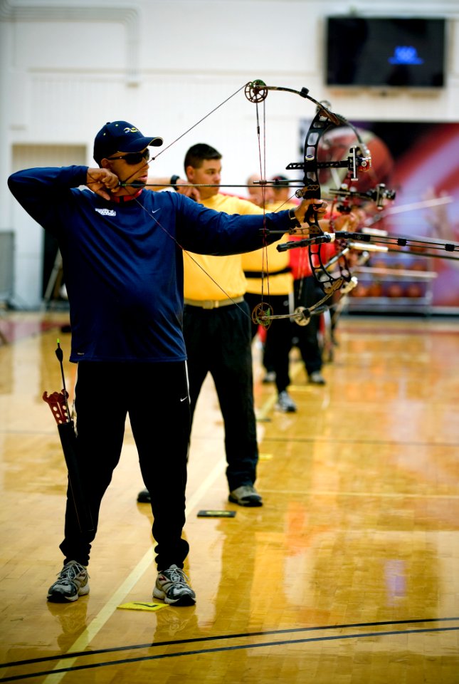 US Navy 100511-N-6932B-143 Chief Electrician's Mate Peter Allen Johns practices for the archery competition at the inaugural Warrior Games in Colorado Springs, Colo