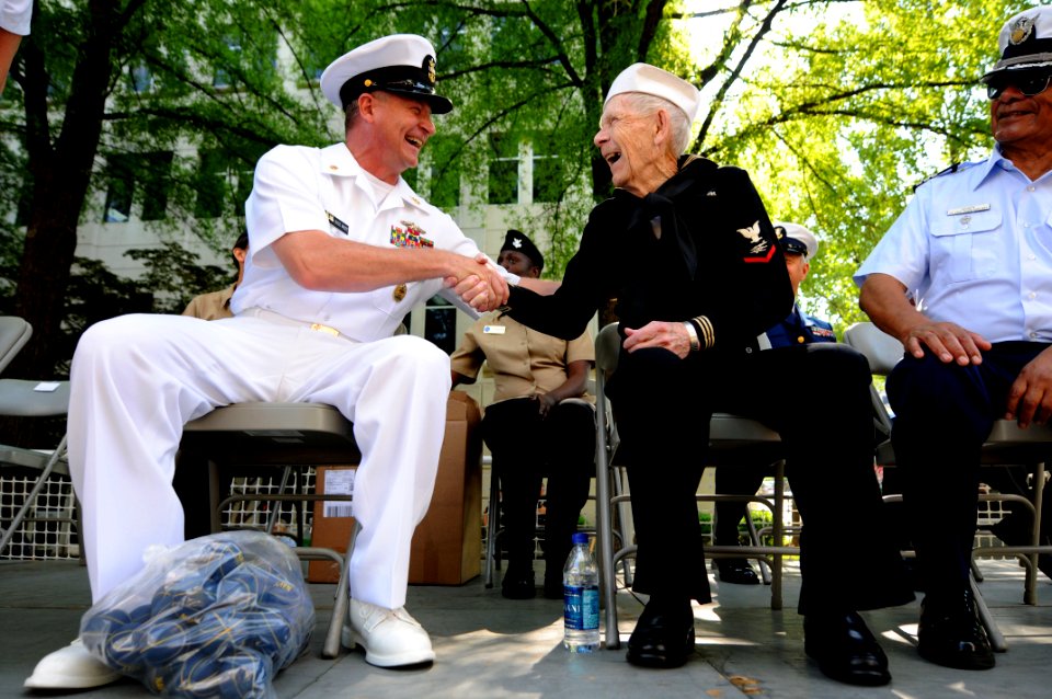 US Navy 100507-N-9818V-071 Master Chief Petty Officer of the Navy (MCPON) Rick West meets Con Crabb on the reviewing stand for the 61st Armed Forces Day Parade