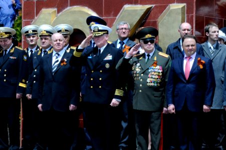 US Navy 100508-N-7478G-150 Capt. Rudy Lupton, center, commanding officer of the U.S. 7th Fleet command ship USS Blue Ridge (LCC 19)