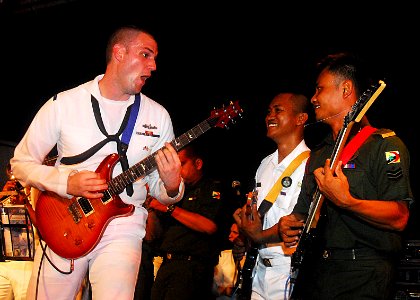 US Navy 100508-N-0995C-596 Musician 3rd Class Chris Kopp of the Commander, U.S. 7th Fleet Band, Oriental Express, performs with the Royal Brunei Navy and Royal Brunei Armed Forces bands at Jerudong Park during Cooperation Afloa