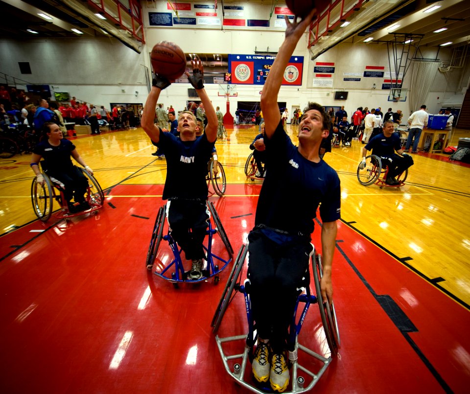US Navy 100511-N-6932B-495 Navy team members warm up for a preliminary wheelchair basketball game against Air Force at the inaugural Warrior Games at the U.S. Olympic Training Center in Colorado Springs, Colo