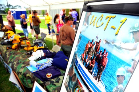 US Navy 100508-N-7367K-009 Patrons view the static display of Underwater Construction Team (UCT) 1 during Seabee Day held on board Naval Construction Battalion Center, Gulfport photo