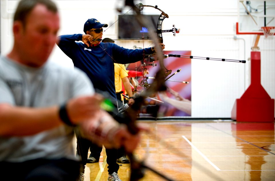 US Navy 100511-N-6932B-141 Chief Electrician's Mate Peter Allen Johns practices for the archery competition at the inaugural Warrior Games in Colorado Springs, Colo