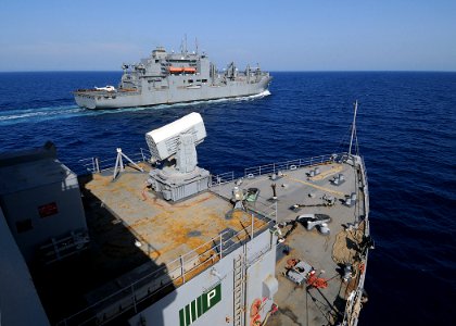 US Navy 100509-N-1082Z-121 The Military Sealift Command dry cargo and ammunition ship USNS Robert E. Peary (T-AKE 5) pulls away from the amphibious dock landing ship USS Ashland (LSD 48)