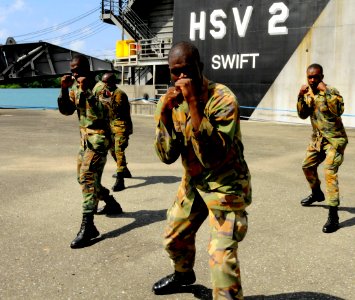 US Navy 100510-N-9643W-557 embers of the Jamaica Defense Force participate in the practical portion of the Marine Corps Martial Arts exchange with Marines embarked aboard Swift (HSV 2)