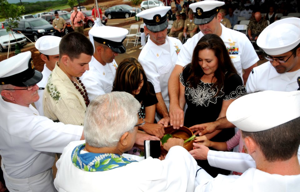 US Navy 100511-N-3666S-108 Sailors and the family of Senior Chief Information Systems Technician (SEAL) Daniel R. Healy participate in a traditional Hawaiian blessing during the dedication and ribbon cutting ceremony at NCTAMS
