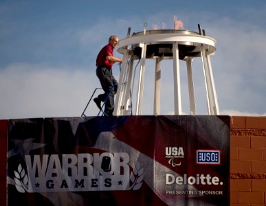 US Navy 100510-N-6932B-151 Navy veteran, Heisman trophy winner and NFL Hall of Fame quarterback Roger Staubach lights the torch at the inaugural Warrior Games at the Olympic Training Center in Colorado Springs, Colo