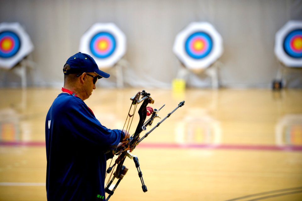 US Navy 100511-N-6932B-136 Chief Electrician's Mate Peter Allen Johns practices for the archery competition at the inaugural Warrior Games in Colorado Springs, Colo
