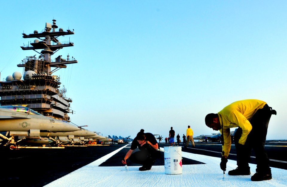 US Navy 100514-N-3595W-003 Sailors paint the flight deck during a no-fly day aboard the aircraft carrier USS Dwight D. Eisenhower (CVN 69)