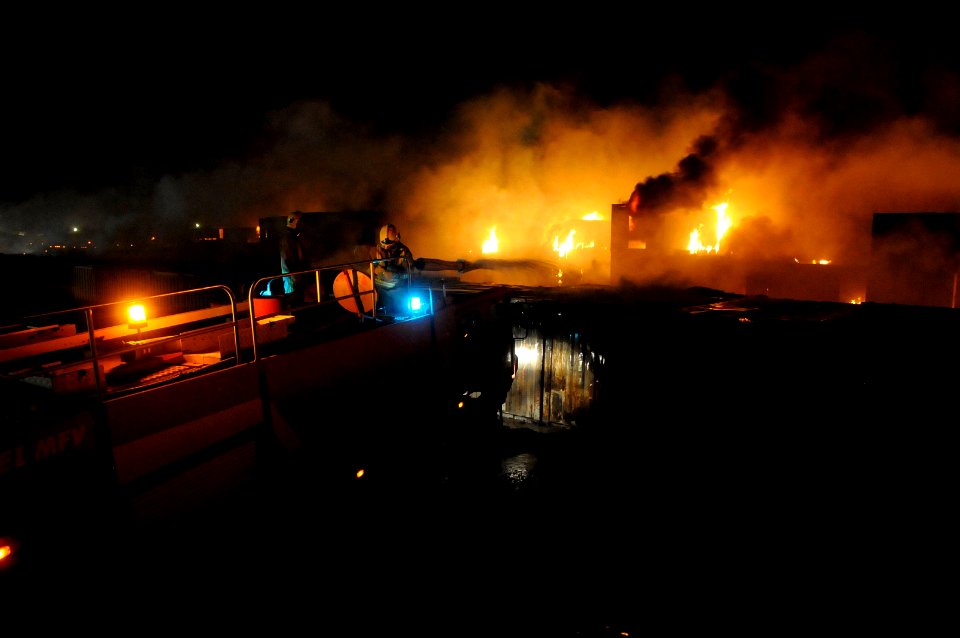 US Navy 100517-N-0475R-844 Emergency responders from Camp Leatherneck and Camp Bastion fight a fire at Camp Leatherneck, Afghanistan