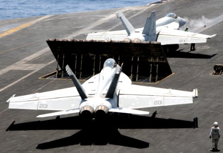 US Navy 100512-N-4236E-310 Aircraft prepare to launch from the aircraft carrier USS Dwight D. Eisenhower (CVN 69)