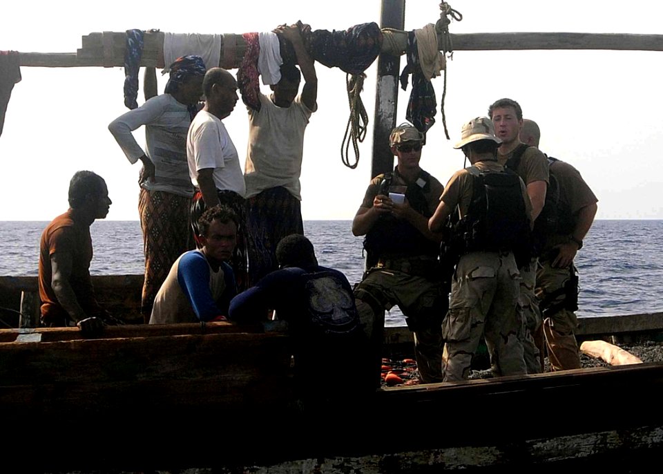US Navy 100517-N-1082Z-013 The approach and visit team assigned to USS Ashland (LSD 48) boards a fishing dhow while conducting maritime security operations