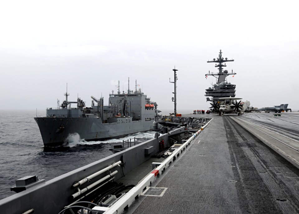US Navy 100518-N-3885H-029 USS George H.W. Bush (CVN 77) is underway alongside USNS Lewis and Clark (T-AKE 1) before an underway replenishment