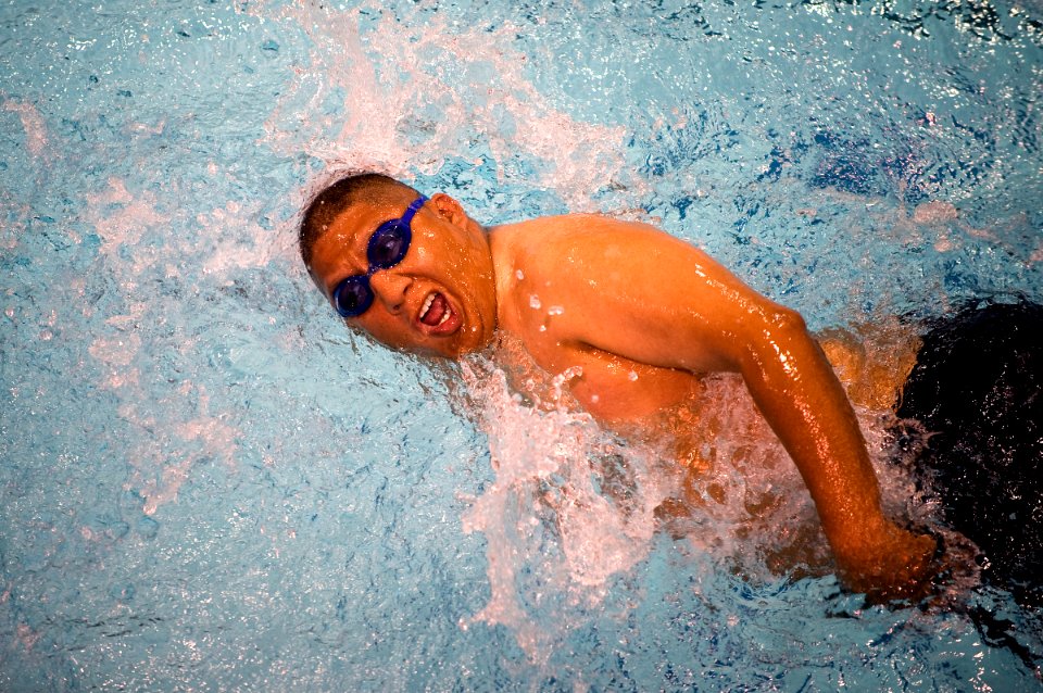 US Navy 100512-N-6932B-451 Boatswain's Mate 1st Class Jim D. Castaneda competes in a preliminary swimming competition in the inaugural Warrior Games
