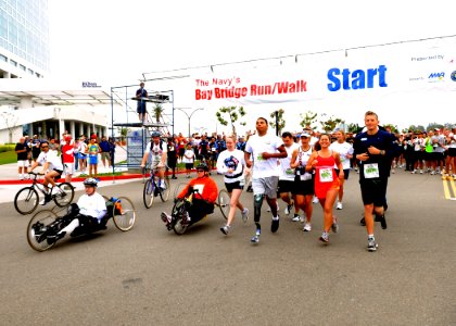 US Navy 100517-N-6326B-029 Twenty-four Army, Navy and Marine Corps patients from the Balboa Warrior Athlete Program, and staff from Naval Medical Center San Diego ran, walked, or cycled across the Coronado Bridge in the Navy's