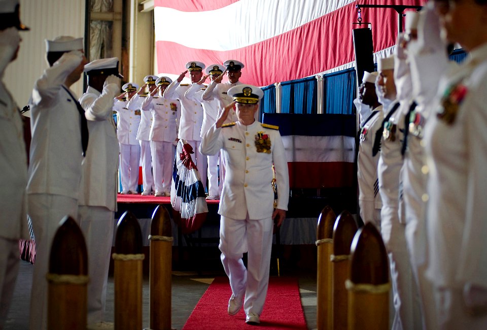 US Navy 100514-N-0807W-374 Vice Adm. H. Denby Starling II, former commander of Navy Cyber Forces and Naval Network Warfare Command salutes while being piped ashore