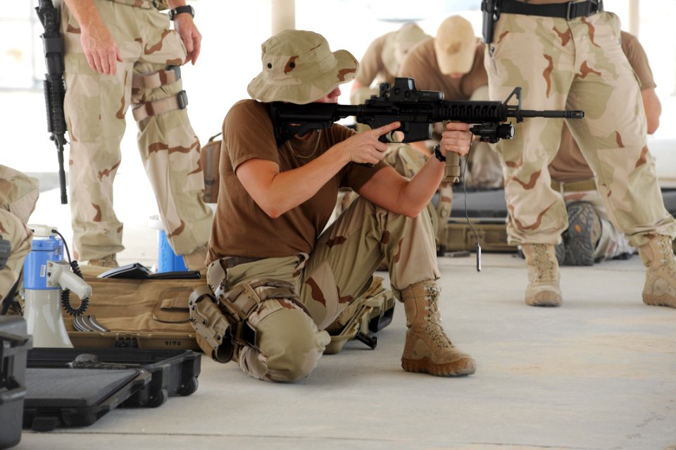 US Navy 100519-N-4776G-106 Hospital Corpsman 2nd Class Ashley Wagner practices dry firing an M-4 service rifle at Shank-Sa Weapons Range