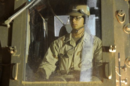 US Navy 100519-N-0475R-120 Equipment Operator 2nd Class Patrick Neill operates a crane at Camp Leatherneck, Afghanistan