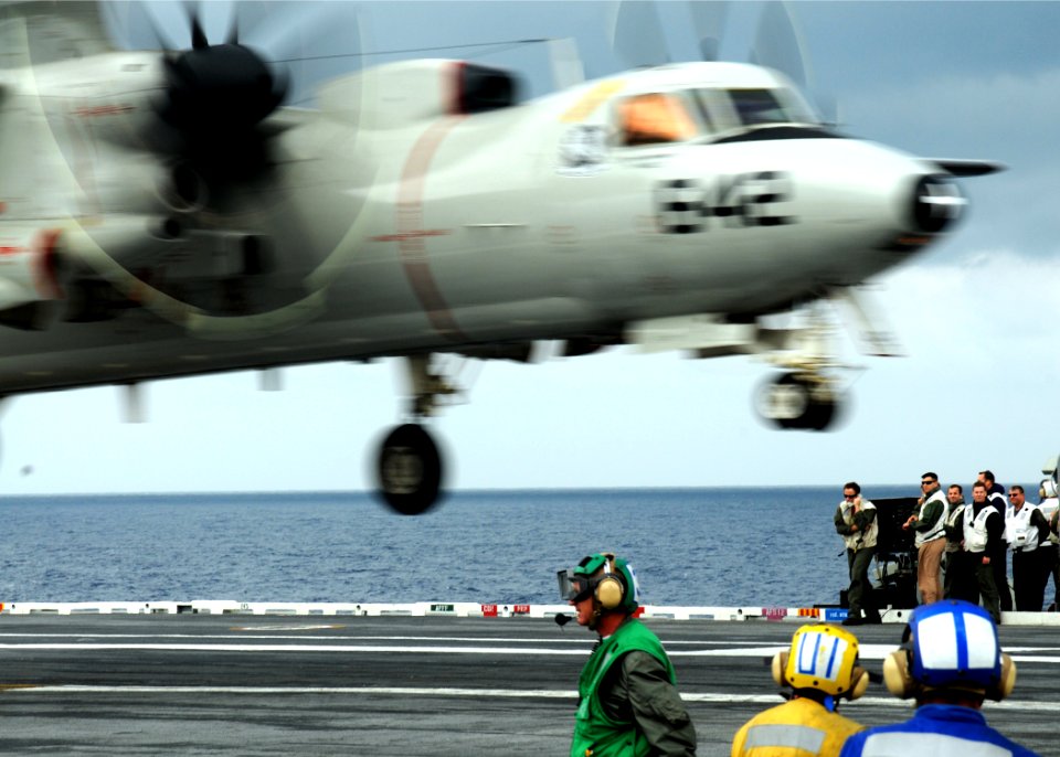 US Navy 100519-N-7908T-196 Landing signal officers watch a landing E-2C Hawkeye