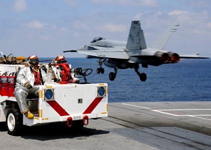 US Navy 100520-N-3885H-038 Crash and Salvage Sailors observe an F-A-18 Hornet launch from USS George H.W. Bush (CVN 77)
