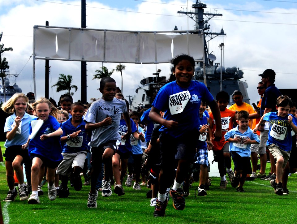 US Navy 100519-N-7498L-053 Children from the Morale, Welfare and Recreation (MWR) Youth Sports Program at Commander, Navy Region Hawaii, participate in a 1.5-mile fun run