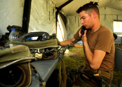 US Navy 100519-N-9564W-036 Equipment Operator Constructionman Jonathan Horner, assigned to Naval Mobile Construction Battalion (NMCB) 74, Alfa Company, photo