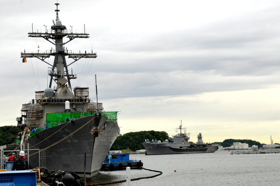 US Navy 100514-N-9123L-001 The guided-missile destroyer USS Fitzgerald (DDG 62), left, is moored at Fleet Activities Yokosuka as the U.S. 7th Fleet command ship USS Blue Ridge (LCC 19) returns from a spring deployment