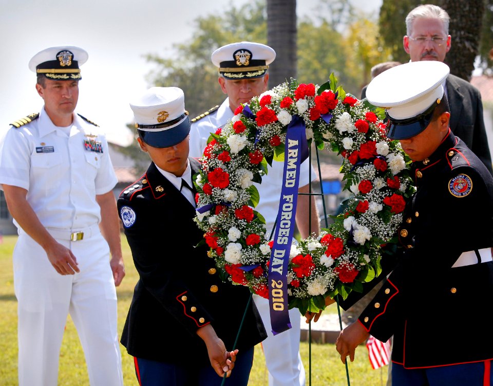 US Navy 100515-N-8863V-331 Sailors and JROTC students place a wreath honoring fallen service members during the inaugural Inland Empire Armed Forces Day event at NSWC Corona