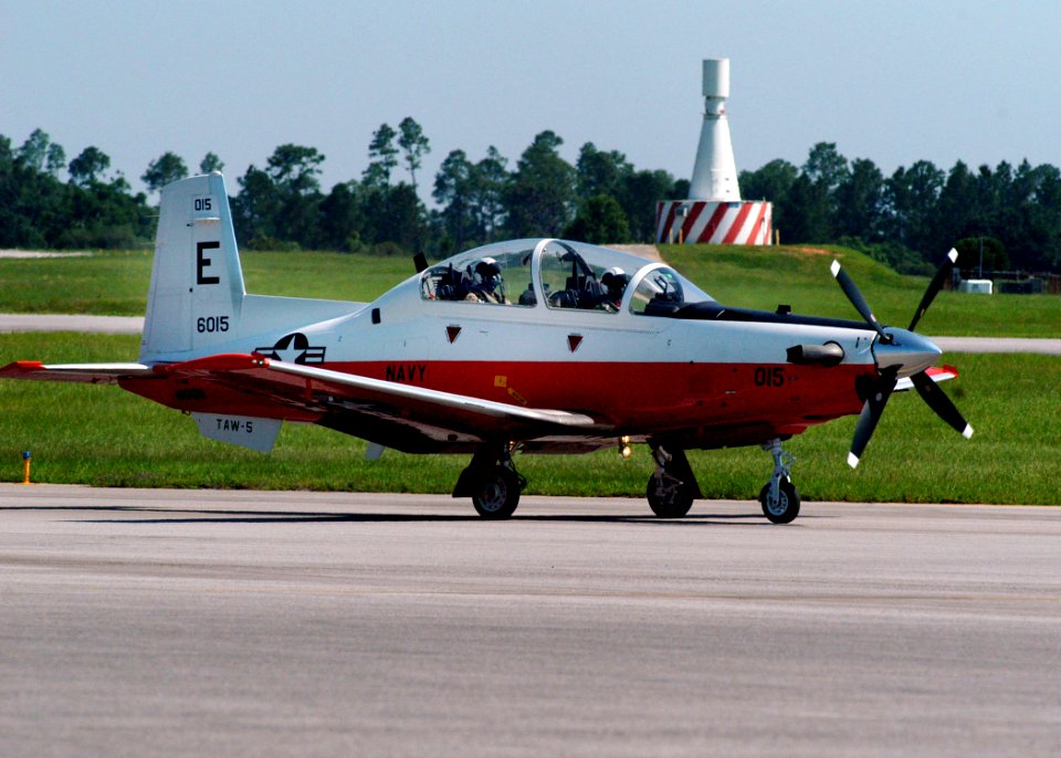 US Navy 100518-N-0321D-002 Ensign Christopher Farkas taxis a new T6-B Texan II. Farkas is the first student to train in the T6-B Texan II