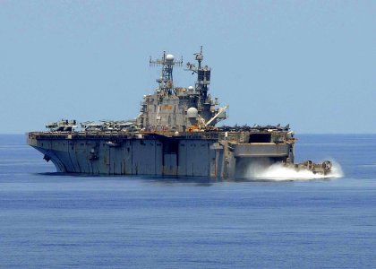 US Navy 100521-N-1082Z-018 Landing Craft Air Cushion (LCAC) 77 transports personnel and equipment from USS Ashland (LSD 48) photo