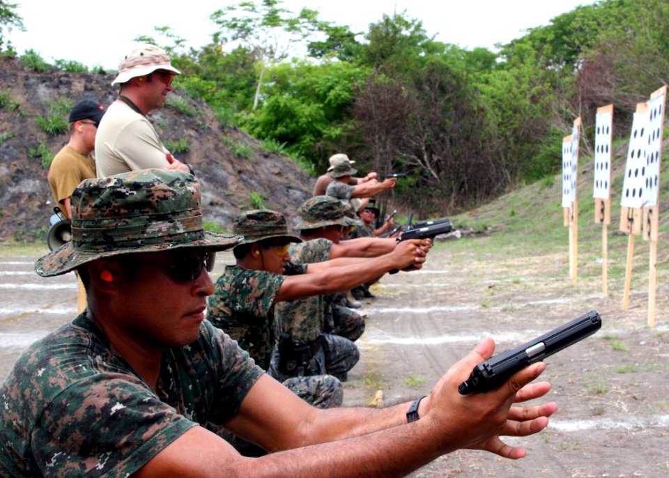 US Navy 100518-N-0000X-005 Sailors from the Fuerza Especial Naval, the Guatemalan Naval Special Forces, participate in a pistol familiarization course
