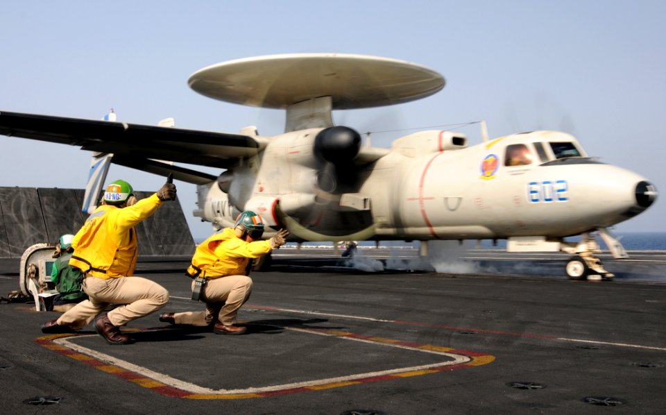 US Navy 100518-N-4236E-153 Lt. Michael Mosi and Lt. Seth Stegmaier launch an E-2C Hawkeye assigned to the Bluetails of Airborne Early Warning Squadron (VAW) 121 from the aircraft carrier USS Dwight D. Eisenhower (CVN 69)