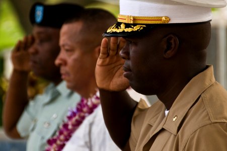 US Navy 100521-N-7498L-014 Lt. Col. (select) Christopher Shaw, assigned to Marine Forces Pacific, salutes the colors during the first Celebration of Life for West Loch Internees at the National Memorial Cemetery of the Pacific