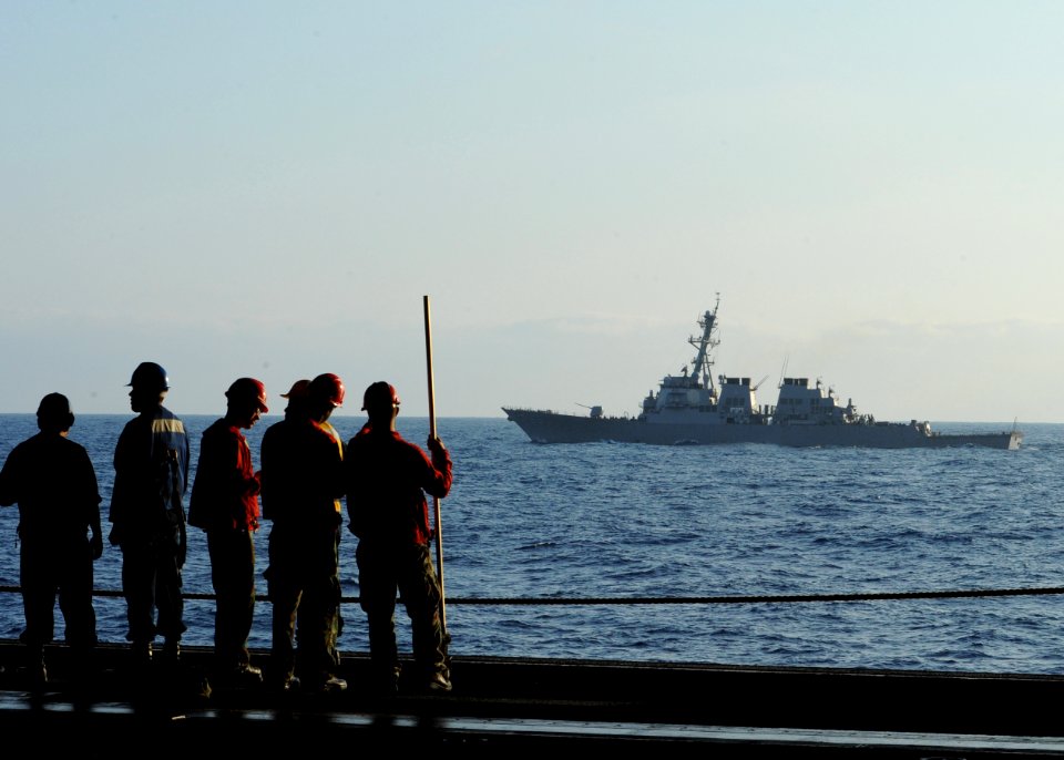 US Navy 100519-N-5838W-025 Sailors from the aircraft carrier USS Enterprise (CVN 65) watch as the guided-missile destroyer USS Gonzalez (DDG 66) comes alongside Enterprise