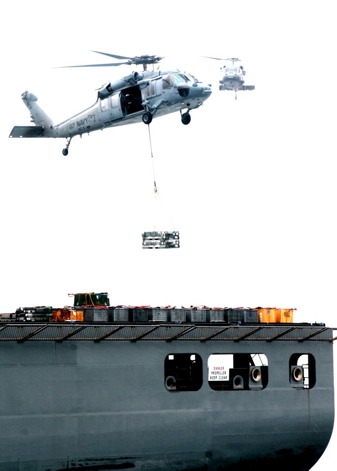 US Navy 100518-N-7908T-497 MH-60S Sea Hawk helicopters transport ammunition from USNS Lewis and Clark (T-AKE 1)