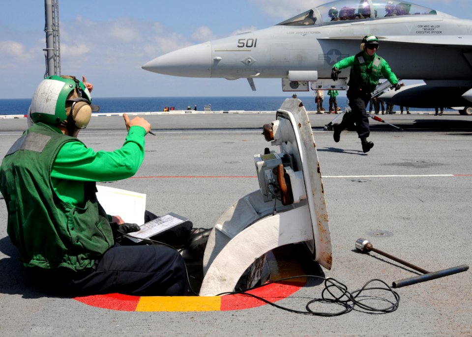 US Navy 100520-N-6509M-222 Sailor gives the thumbs up for launch to an F-A-18F Super Hornet