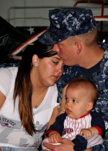 US Navy 100521-N-8102J-018 Aviation Support Equipment Technician 2nd Class Cory Chevaller says good-bye to his wife
