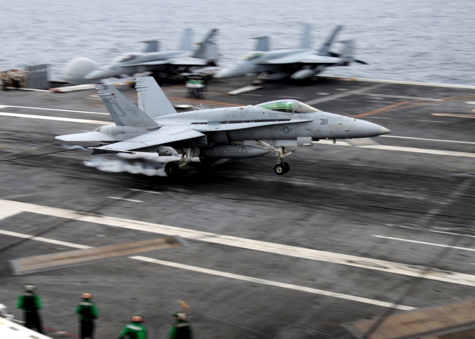 US Navy 100522-N-6632S-292 An F-A-18C Hornet assigned to the Valions of Strike Fighter Squadron (VFA) 15 lands aboard the aircraft carrier USS George H.W. Bush (CVN 77)