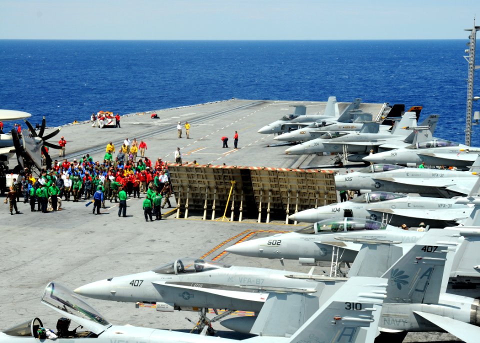US Navy 100521-N-7908T-013 Sailors aboard the aircraft carrier USS George H.W. Bush (CVN 77) perform a foreign object debris walkdown