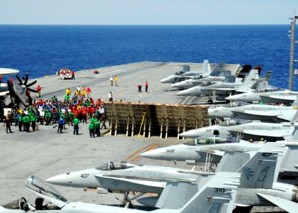 US Navy 100521-N-7908T-013 Sailors aboard the aircraft carrier USS George H.W. Bush (CVN 77) perform a foreign object debris walkdown