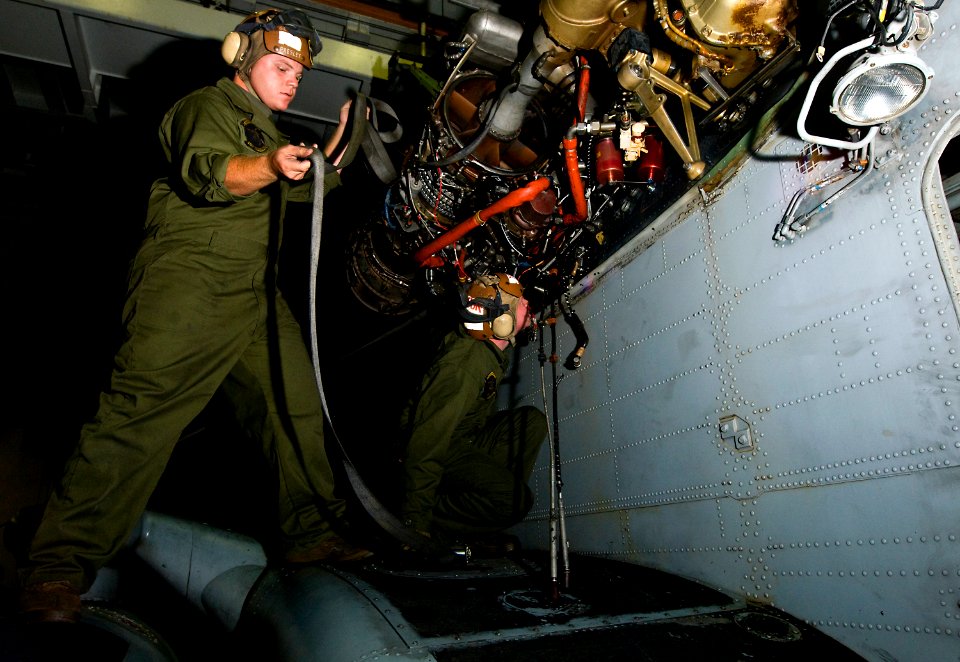 US Navy 100523-N-7948R-136 Sailors perform maintenance on a Super Stallion