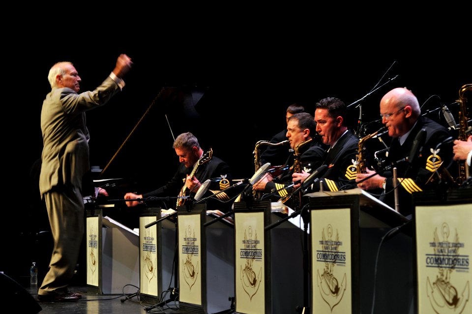 US Navy 100522-N-0773H-054 Retired Master Chief Musician Jeffrey Taylor, left, the Commodores unit leader from 1975-1977 and 1979-1986, leads the Commodores as they perform various works that highlighted his career