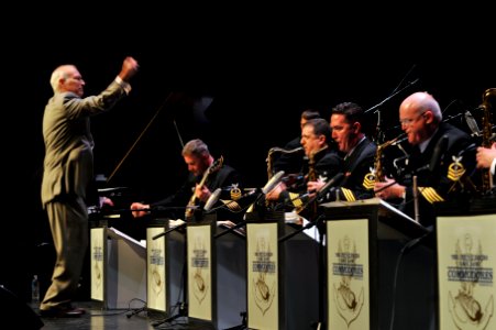 US Navy 100522-N-0773H-054 Retired Master Chief Musician Jeffrey Taylor, left, the Commodores unit leader from 1975-1977 and 1979-1986, leads the Commodores as they perform various works that highlighted his career