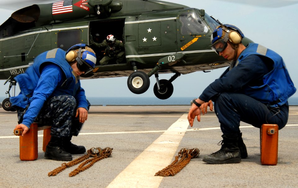 US Navy 100522-N-0864H-237 Religious Programs Specialist Seaman Matthew Clinton and Seaman Juan Roitman wait