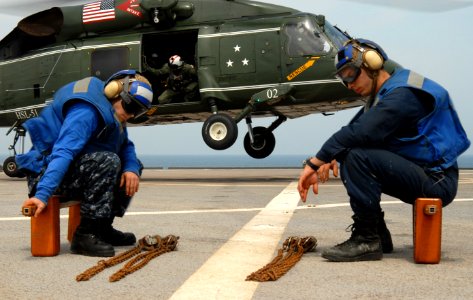 US Navy 100522-N-0864H-237 Religious Programs Specialist Seaman Matthew Clinton and Seaman Juan Roitman wait