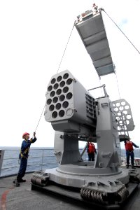 US Navy 100526-N-4135M-112 Sailors load a Rolling Air Frame Missile (RAM) launcher aboard the aircraft carrier USS Harry S. Truman (CVN 75)