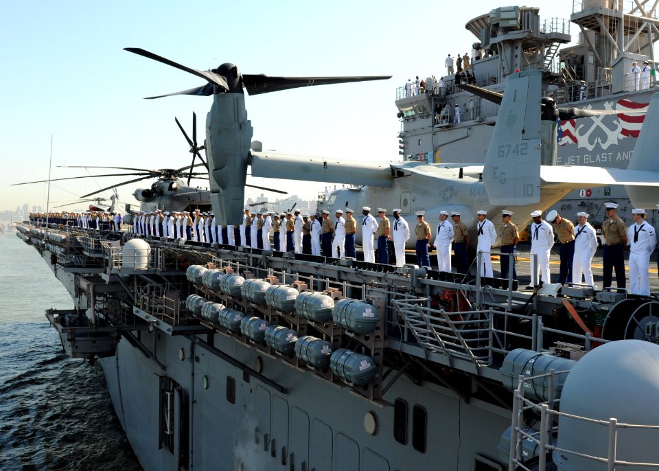 US Navy 100526-N-6676S-079 Sailors and Marines man the rails as the multi-purpose amphibious assault ship USS Iwo Jima (LHD7) passes by Staten Island en route to Fleet Week New York 2010