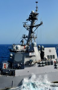 US Navy 100524-N-3595W-004 The guided-missile destroyer USS Farragut (DDG 99) is underway alongside the aircraft carrier USS Dwight D. Eisenhower (CVN 69) during a replenishment at sea